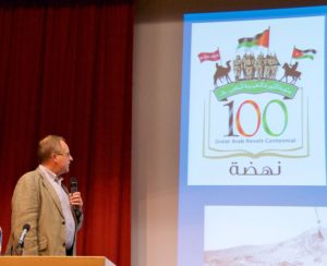 Chairman Philip Neale opens proceedings in the centennial year of the outbreak of the Arab Revolt